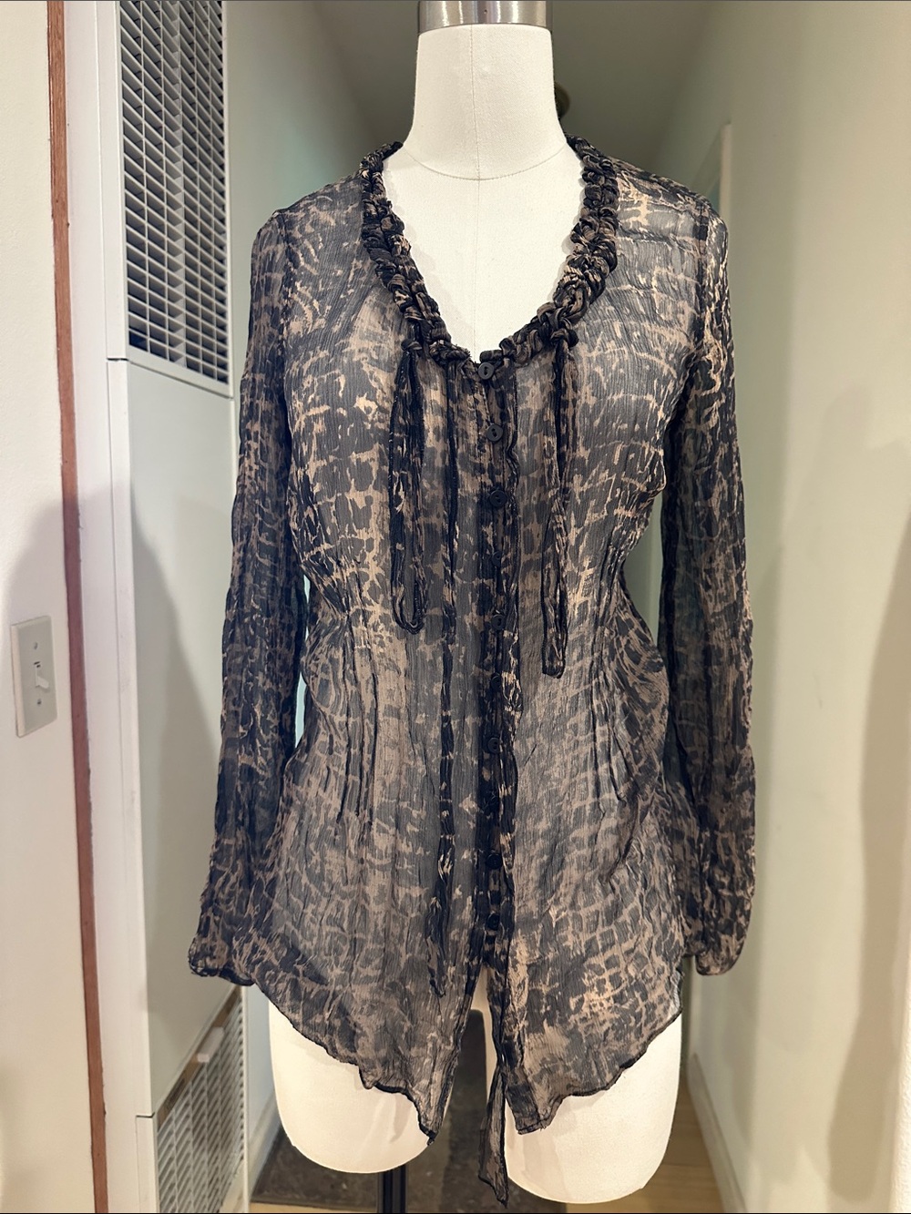 Sheer Blouse in an animal block print